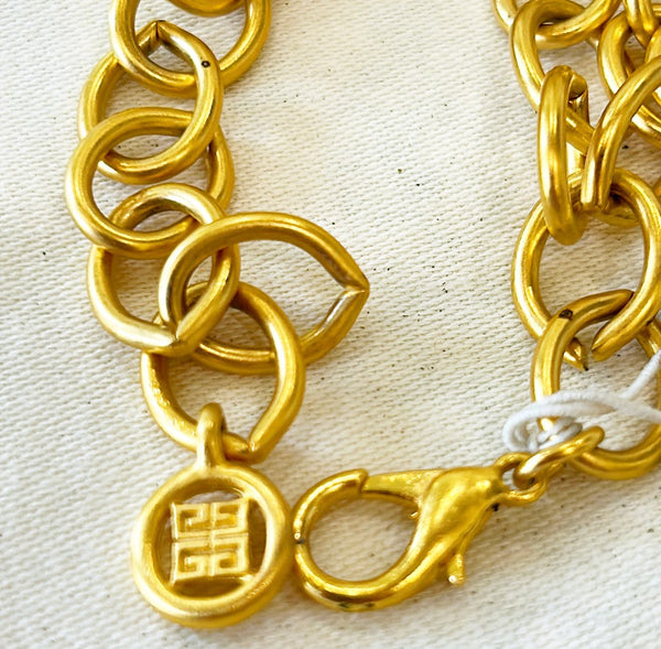 Classic 80s vintage stamped GIVENCHY heart gold tone link heart charm bracelet with multi links