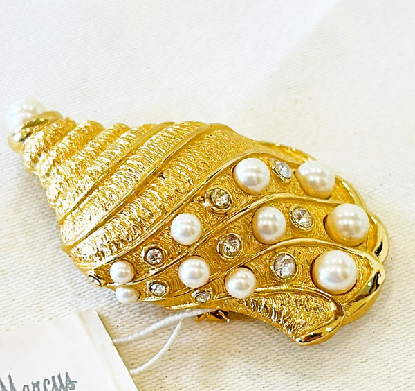 Rare signed Christian Dior large gold tone seashell brooch with stimulated petal & rhinestone accents.