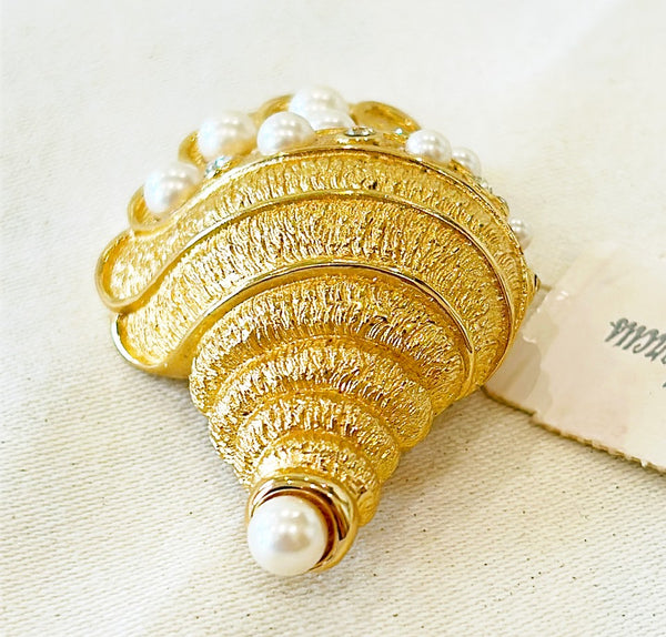 Rare signed Christian Dior large gold tone seashell brooch with stimulated petal & rhinestone accents.