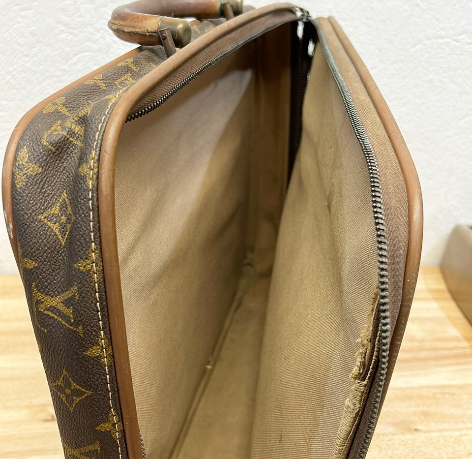 Vintage Louis Vuitton travel mini suite case with B monogram.