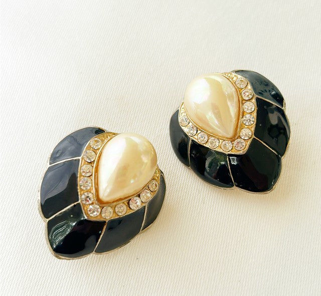 Stunning vintage black enamel style clip earrings.