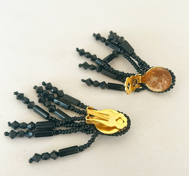 Classic black beaded clip on earrings from the late 80s.