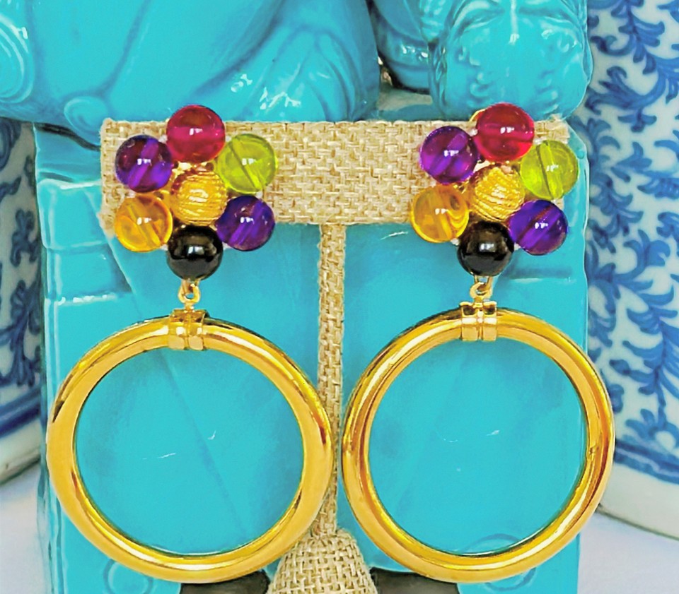 Runway style 80s large scale clip on earrings.