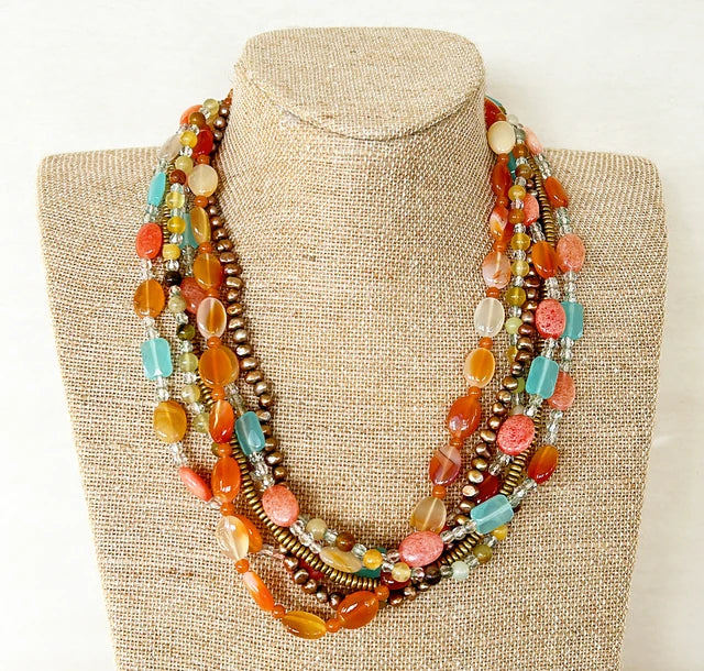 Vintage signed Don Caster multi Strand cluster beaded necklace.