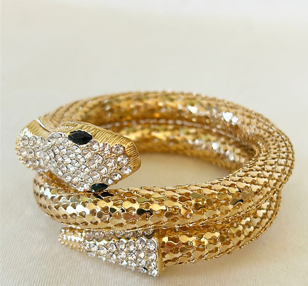 Vintage gold tone metal snake bracelet- flexible style design.