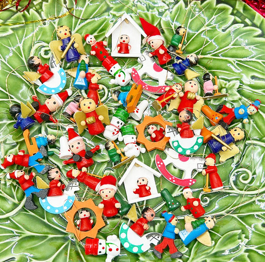 Vintage miniature wooden painted Christmas tree ornaments.