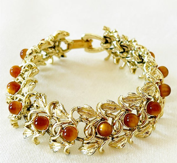 1960s signed Judy Lee leaf cocktail link style bracelet with leaf details mixed with tigers eyes stones.