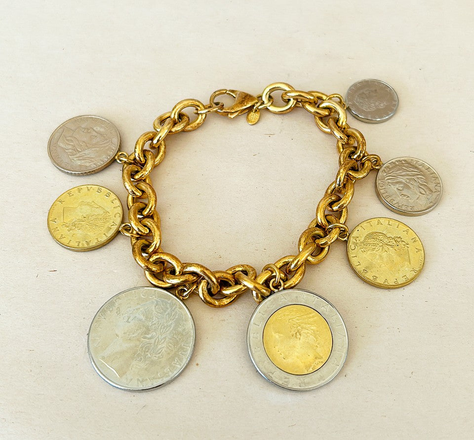 Amazing vintage Italian 18k gold over silver stamped Italian coin charm bracelet.