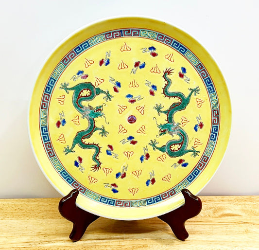 Yellow vintage chinoiserie dancing dragon platter.