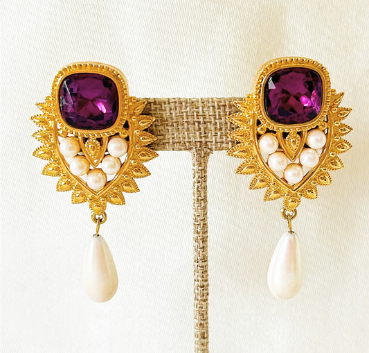 Vintage 80s signed Elizabeth Taylor statement size clip on earrings.
