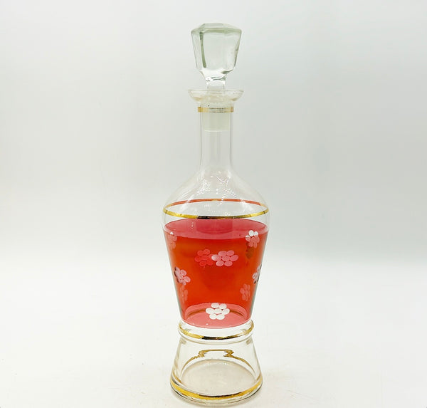 Vintage 1960s mid century glass decanter with top lid.