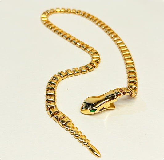 Modern style gold link snake design necklace.