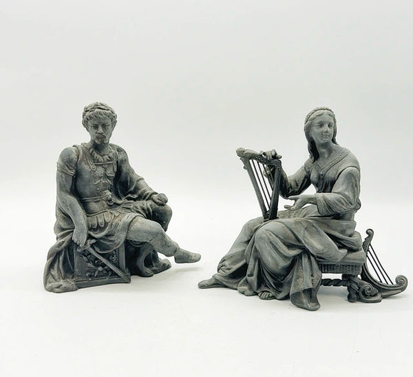 Antique late 1800s cast metal woman and man clock toppers