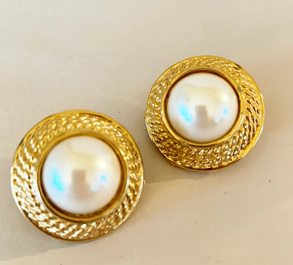 Classic faux pearl clip on vintage earrings.
