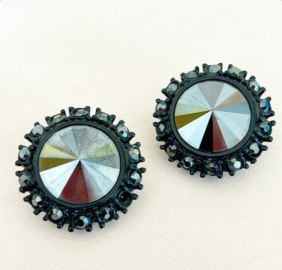 Signed St. John Rare jet back crystal clip on earrings.