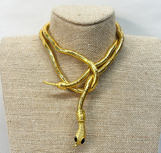 80’s sculptural style gold metal omega look that can be twisted and shaped into a necklace