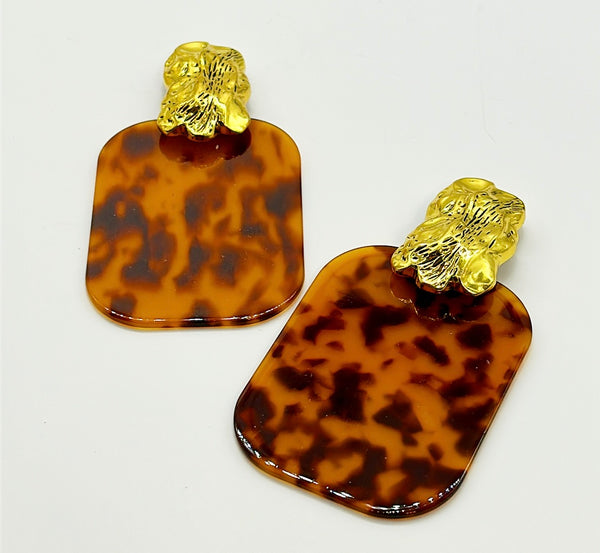 Fabulous late scale statement clip on earrings.