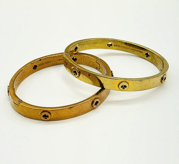 Vintage set of 2 Kate Spade hinged gold tone metal bracelets