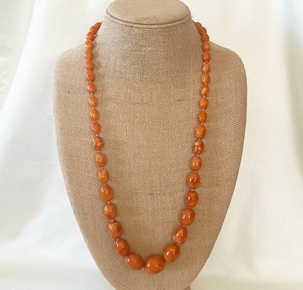 Vintage signed Kenneth Lane amber style beaded statement necklace.