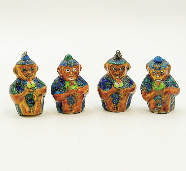 Set of 4 vintage 80s metal painted enamel monkey figures.