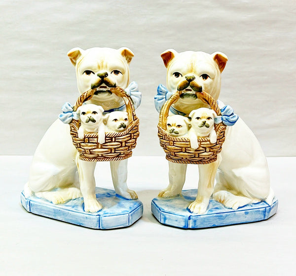 Vintage left &amp; right facing pug dog figures holding baskets with tiny puppies.