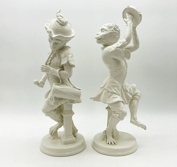 Vintage pair of large Italian cream ware style musical dancing monkeys.