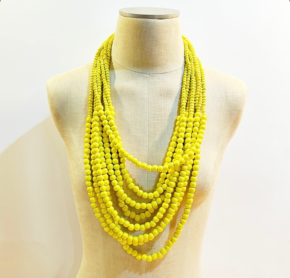 Vintage Spring yellow wooden beaded statement necklace .