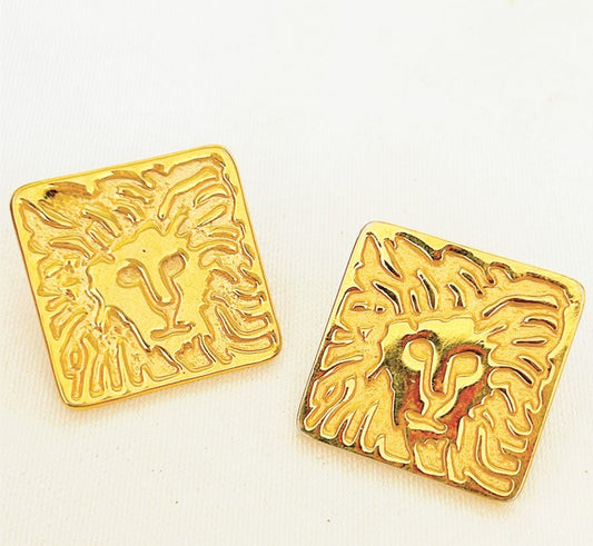 Vintage 1980s classic Anne Klein square medallion signature lion head earrings.