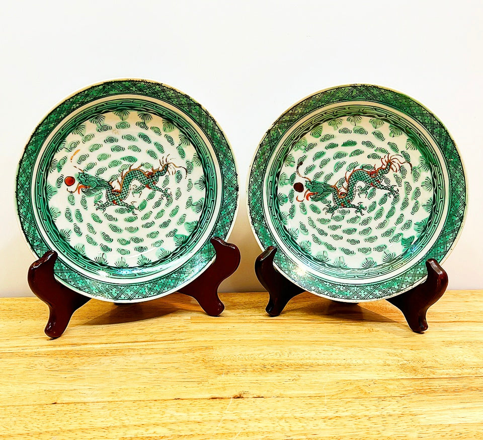 Pair of vintage green &amp; white chinoiserie dancing dragon plates / shallow bowls