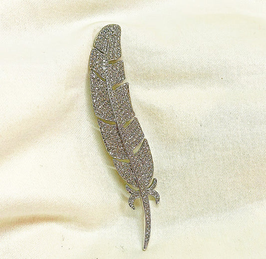 Classic signed Carolee rhinestone encrusted feather designer brooch.