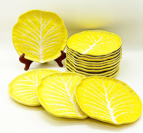 Amazing large 14 piece matching set of vintage yellow cabbage ware plates.