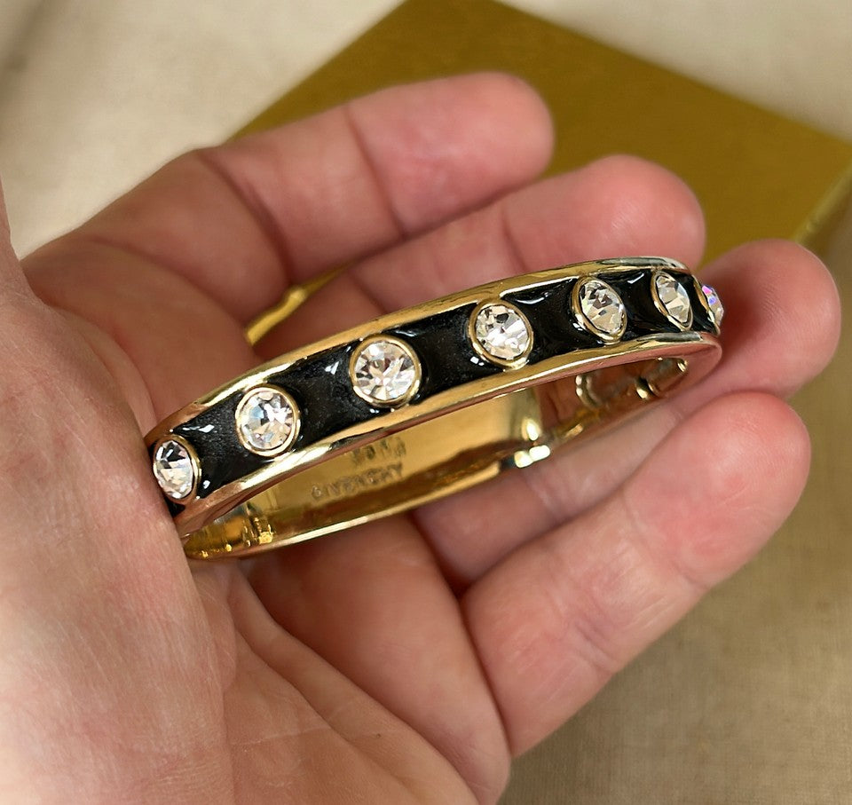 Rare early 90s stamped GIVENCHY bangle bracelet with working clasp that opens.