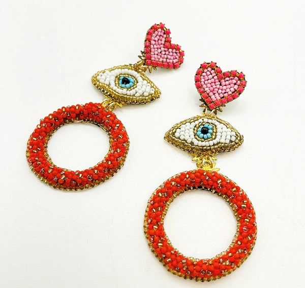 Large light weight vintage beaded eyes &amp; hearts pierced style statement earrings.