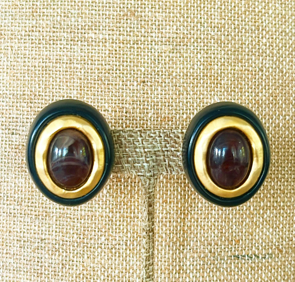Classic oval clip on designer style vintage earrings.