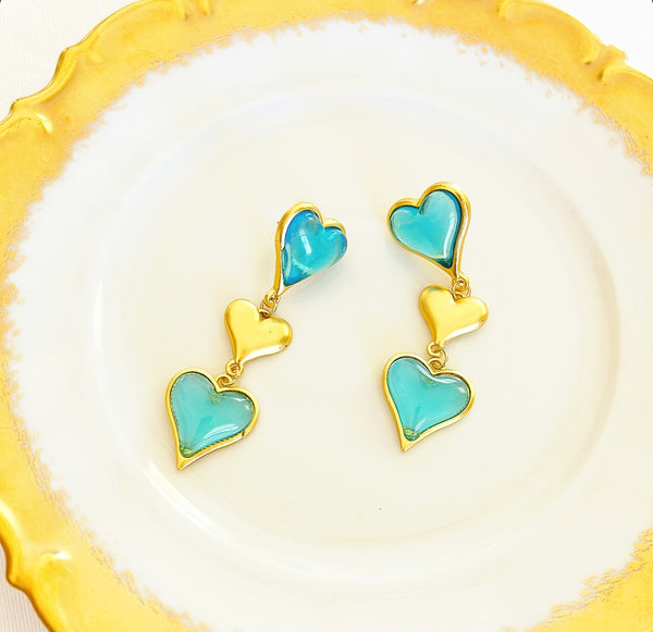 Fun triple dangling hearts pierced earrings.