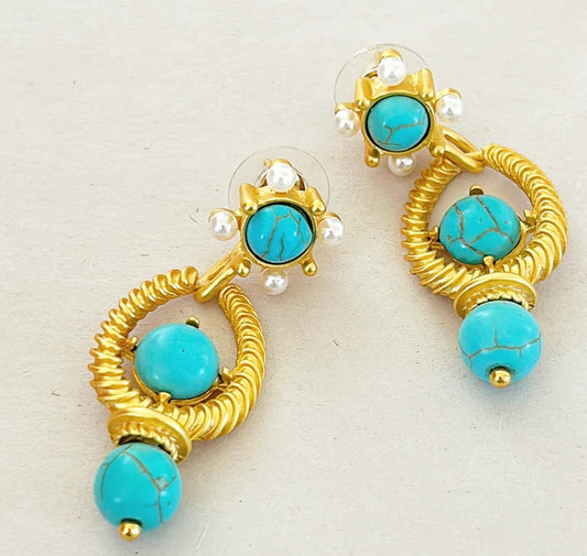 Beautiful faux turquoise pierced earrings.