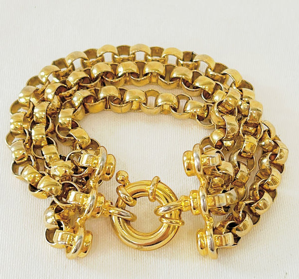 Vintage gold tone 3 strand link bracelet with thick style clasp.