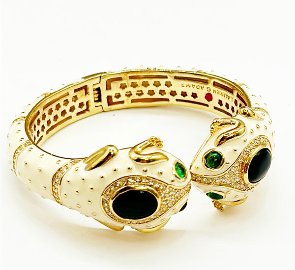 Fabulous double frog head hinged bracelet with clamper style closure.