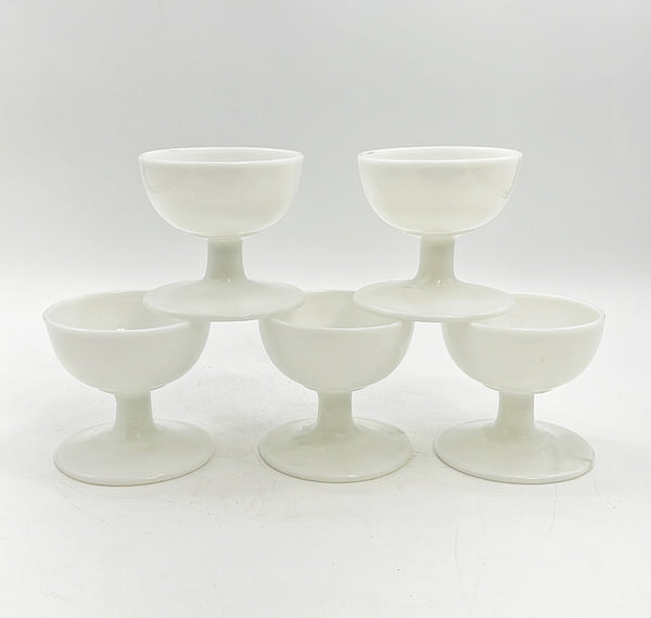 Vintage mid century white milk glass champagne coupes.