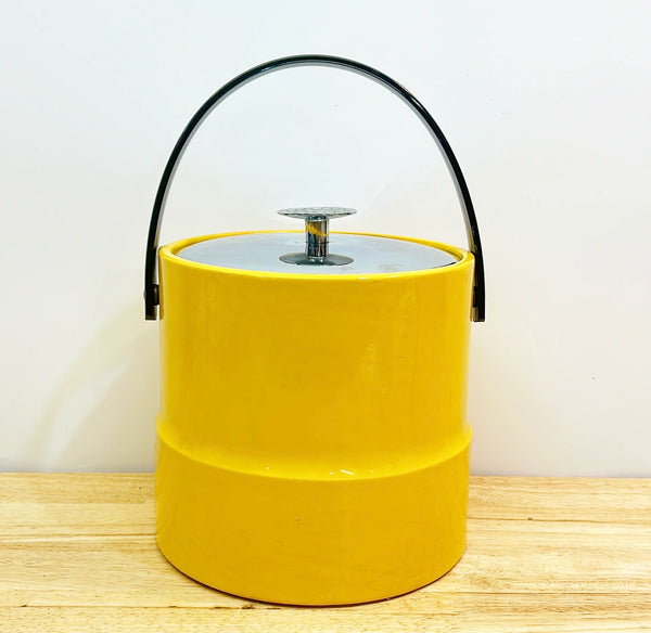 Fun yellow patent style vintage ice bucket with black patent handle.