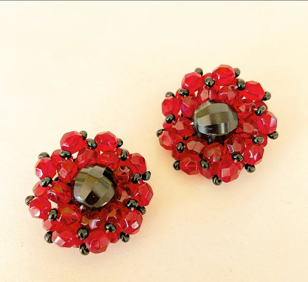 1960s larger style clip on beaded earrings.