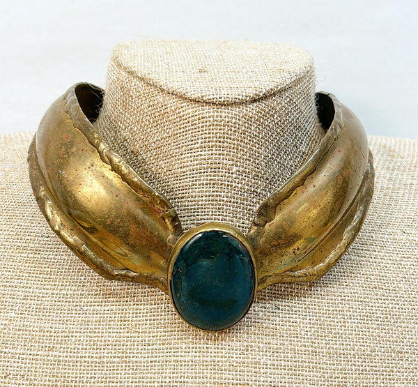 Dramatic collar vintage necklace. 80s brutalist style aged brass finish with a lathe oval black onyx stone. One piece. Signed made in India on back. Approx 5.25” wide x 5” deep. Oval stone approx 1.5” x 1.25.