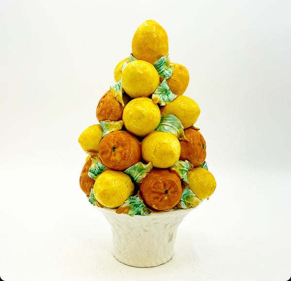 1960s vintage citrus Italian topiary. Mix of lemons and oranges with green leaves in a white woven style base basket