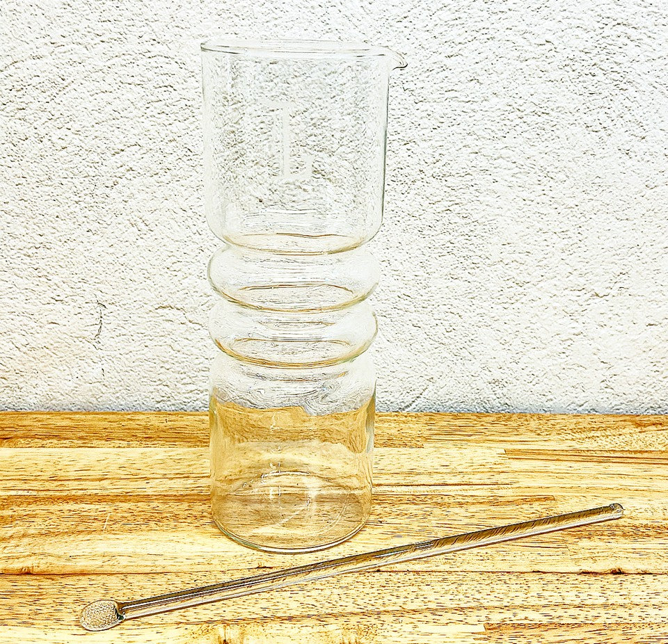 Vintage 1960s glass tall cocktail glass stirrer with glass stir stick.