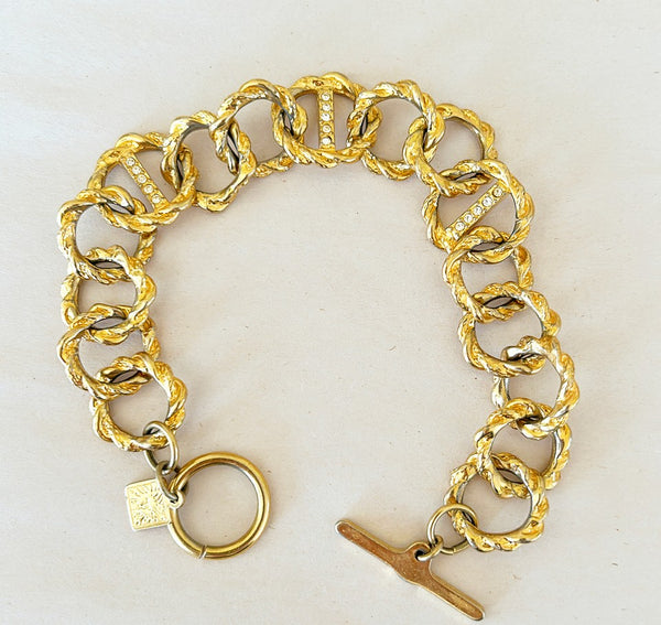 80a signed Anne Klein gold link bracelet.