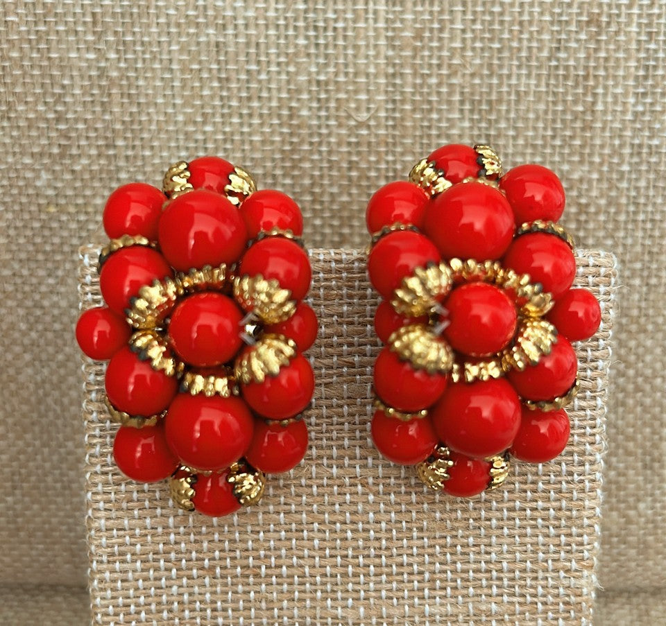 Bold vintage red beaded clip on earrings from the 70s.