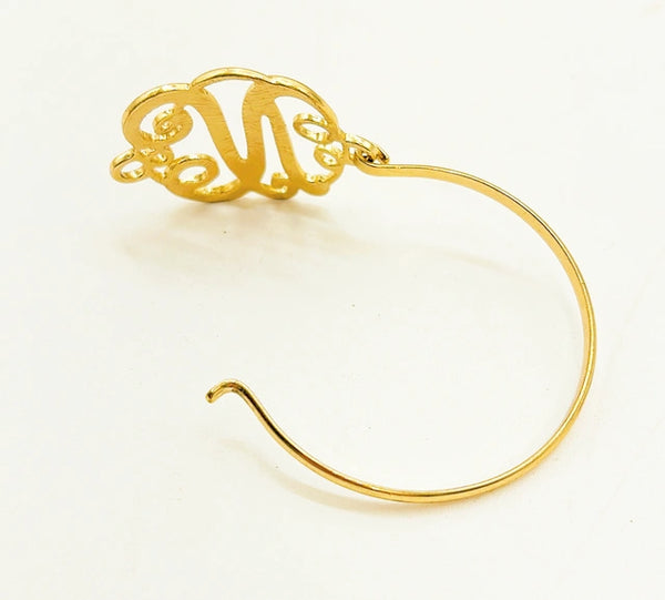 Vintage gold metal finished “N” monogrammed traditional bracelet.