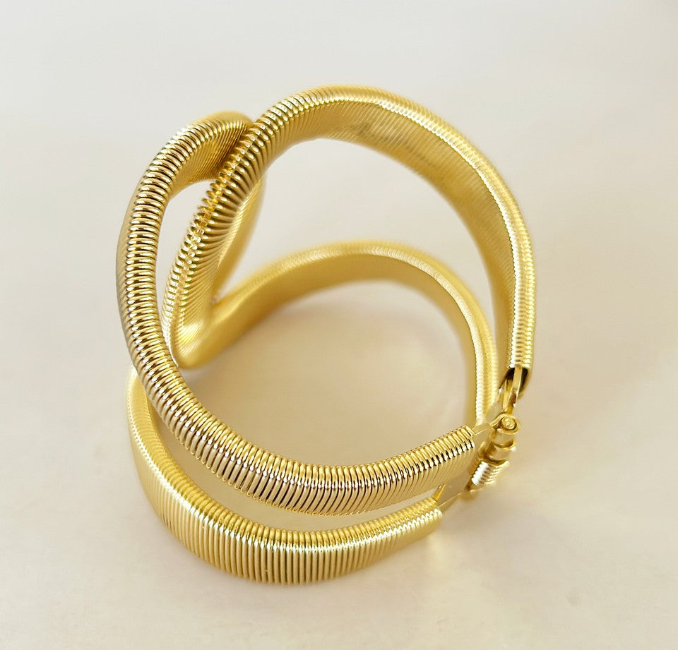 Gold double c style hinged designer statement bracelet
