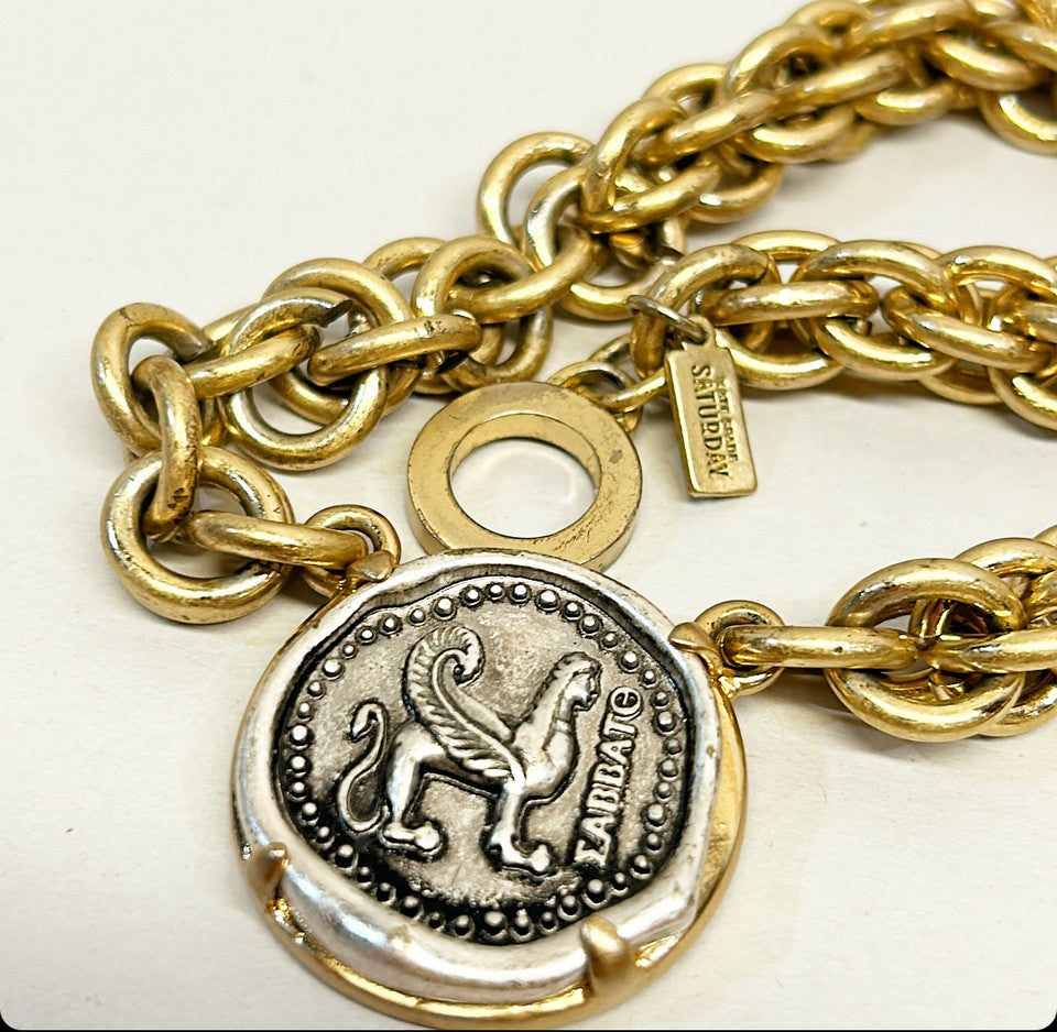 Rare signed Kate Spade “Saturday” coin necklace.