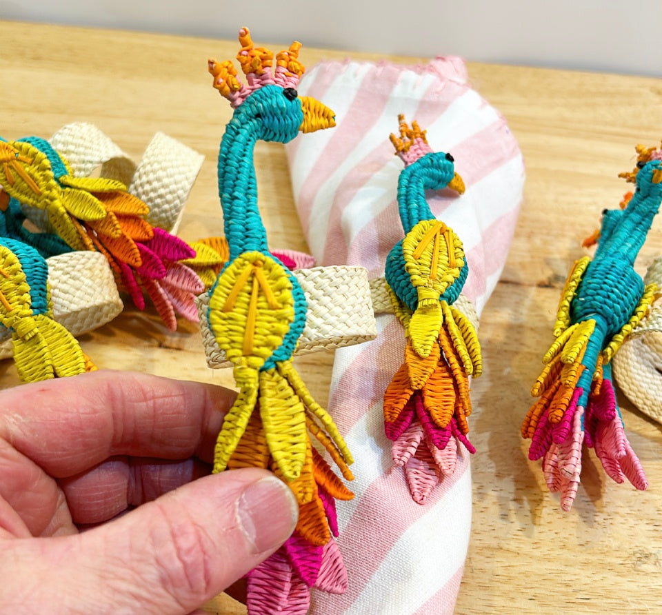 Set of 8 rattan woven style peacock bird designed decorative napkin rings.